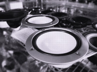 Louder, Faithful, and Consistent. Using Digital Signal Processing to Improve Loudspeaker Performance