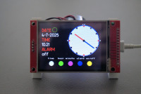 Digital and analog clock on a TFT touch display.
