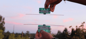 Battery-free Communication Devices Harvest Energy from Ambient Radio Signals