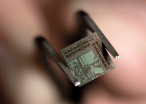 The “end-to-end transmitter-receiver” chip boasts a unique architecture combining digital and analog components on a single platform (Photo: Steve Zylius / UCI).