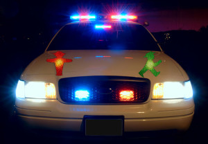 Patrol cars switch traffic signals