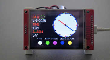 Digital and analog clock on a TFT touch display.