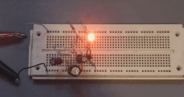 Sinusoidal LED fader using Twin-T oscillator