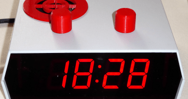 Efficient alarm clock with low electromagnetic radiation, big display and music player