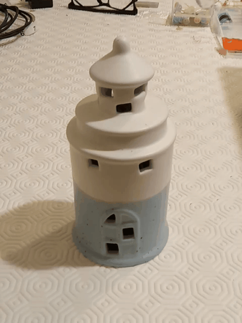 Flashing lighthouse thermometer