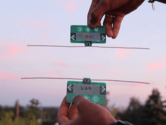 Battery-free Communication Devices Harvest Energy from Ambient Radio Signals