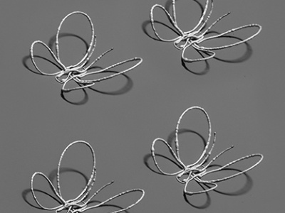 Laser-assisted direct silver-ink writing allowed this delicate 3D butterfly to be printed without any auxiliary support structure. ©Lewis Lab / Wyss Institute at Harvard University