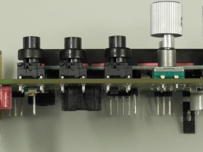 Side view on buttons of Microcontroller Board for FPGA DSP (160410-1 v1.1) Side view on buttons of Microcontroller Board for FPGA DSP (160410-1 v1.1)