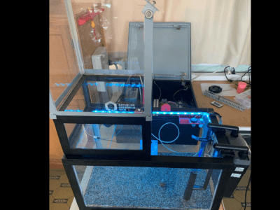 Automated aquarium with greenhouse