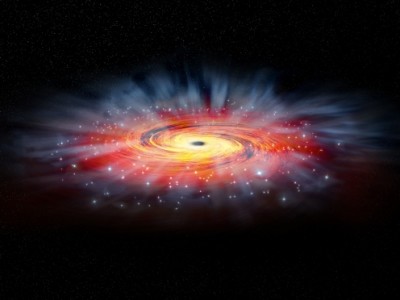 Künstlerische Freiheit: So könnte die Umgebung des Schwarzen Lochs Sagittarius A+ aussehen (Bild: NASA/CXC/M.Weiss).
