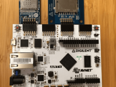 Arty FPGA Board mit Pmod WiFi auf der linken Seite und Pmod SDcard Slot auf der rechten Seite.