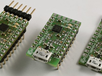 Three versions of the USB-RS232 converter PCB 180537-1 v1.0 Frol left to right, all pin headers, self-powered, a socket for K2