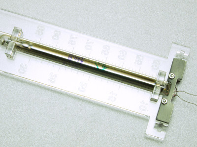 Scale with IN-9 tube backside Laser cut acrylic scale with IN-9 tube mounted, backside view