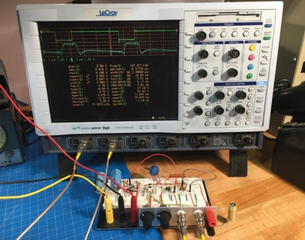 The output of the oscillator as well as the output of the ESR meter while testing a 50 μF electrolytic capacitor.