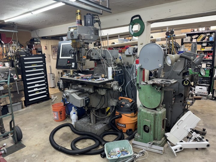 Workspace with a Supermax YCM-16VS mill.