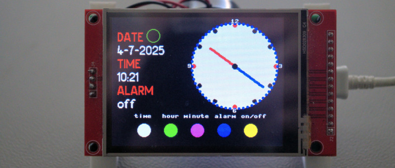 Digital and analog clock on a TFT touch display.