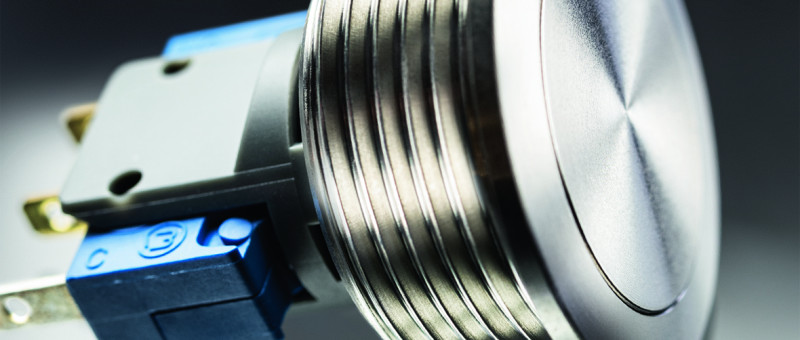 SCHURTER erweitert eMSM Metal Line-Serie um einen puristischen 24-mm-Taster in Edelstahl