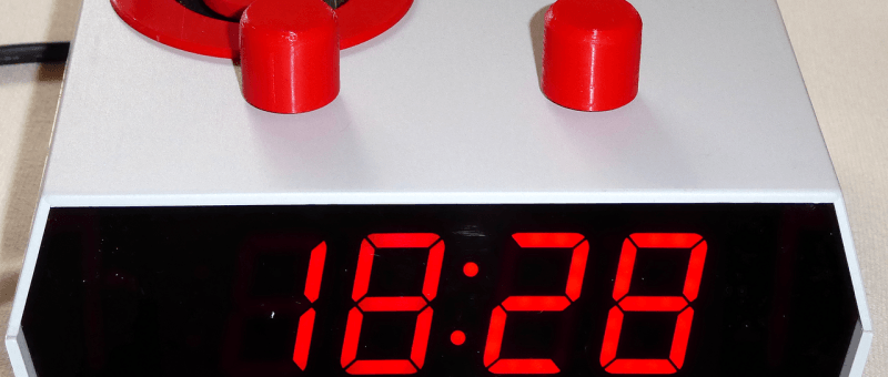 Efficient alarm clock with low electromagnetic radiation, big display and music player