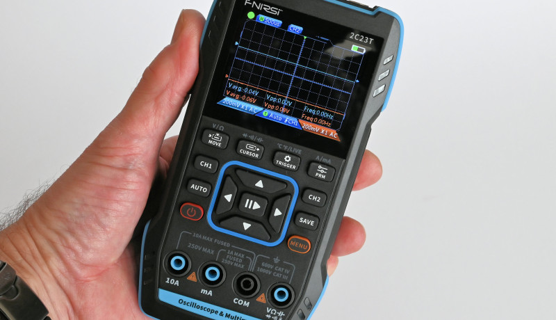 The Fnirsi 2C23T is compact and fits easily in one hand.