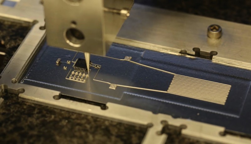 Hybrid 3D printer uses flexible conductive ink. (Photo courtesy of Harvard Wyss Institute)