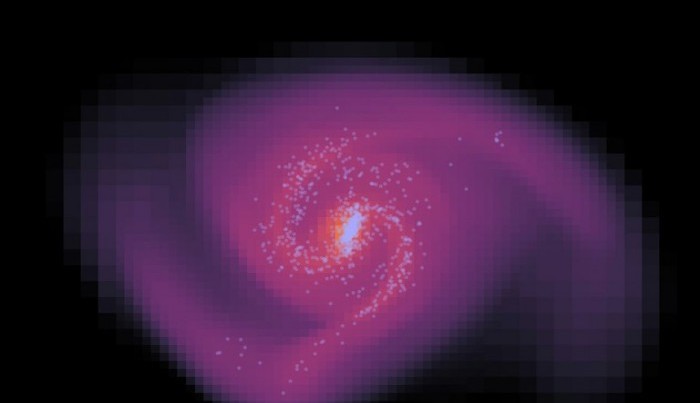 Materieverteilung 1,5 Milliarden Jahre nach Simulationsstart (hellere Farbe = dichteres Gases; hellblaue Punkte = junge Sterne). Bild: AG Kroupa / Uni Bonn.