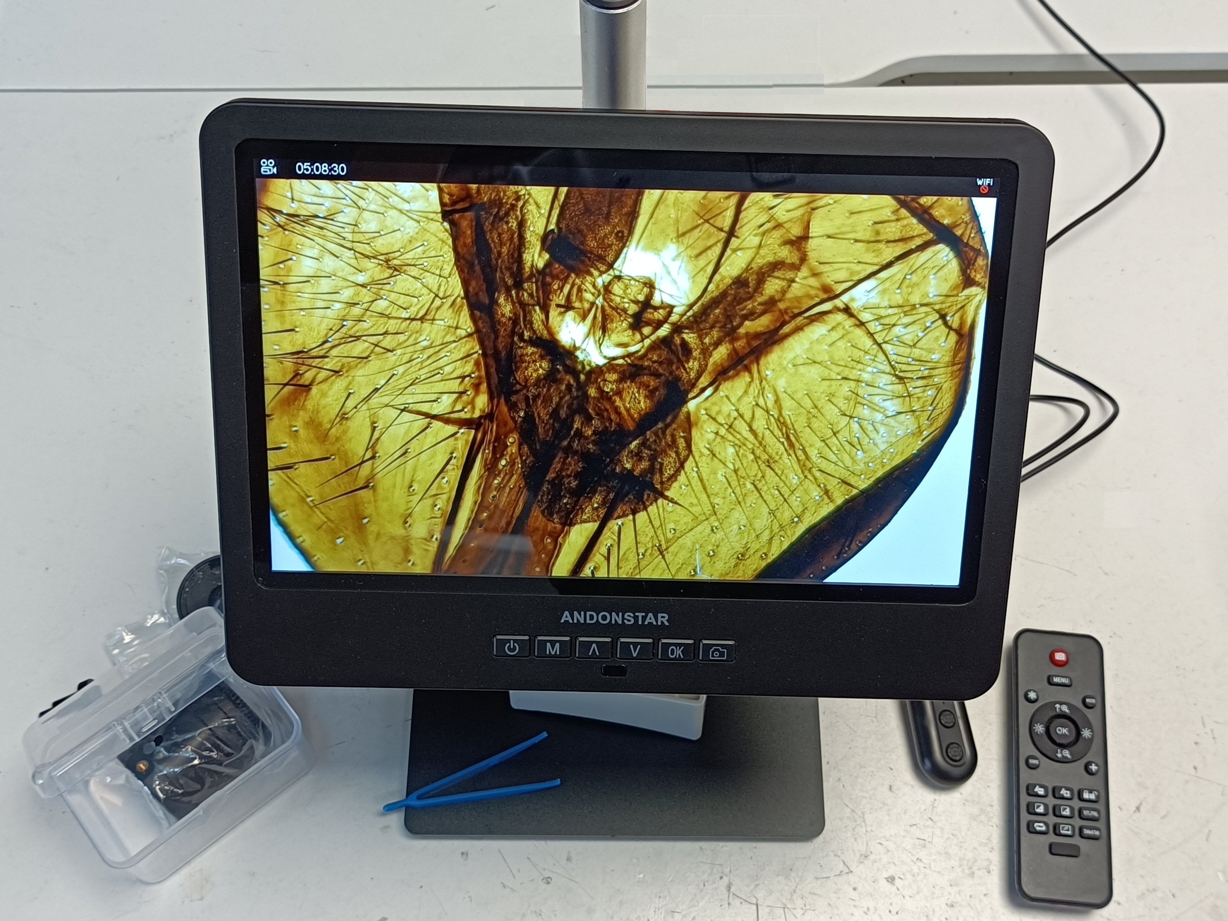 The Andonstar AD249SM is a digital microscope with a 10inch display
