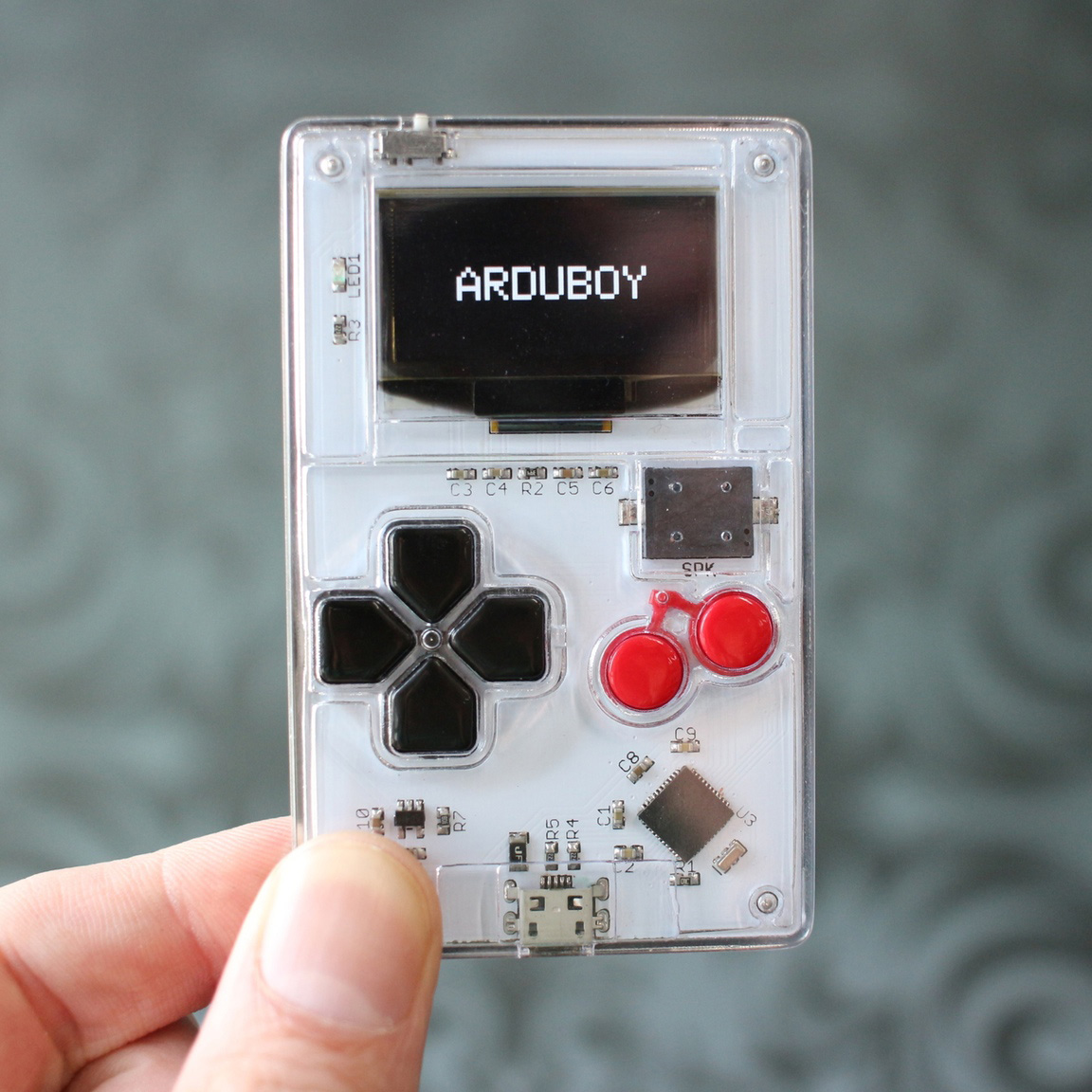 Arduboy: a credit card size game system with 8-bit look & feel 