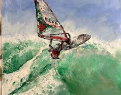 Sailsurfer in de golven 