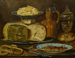 Stilleven met kaas dadels en krakelingen