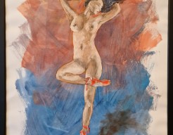 Ballerina with red pointe shoes