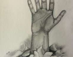 De hand die omhoog rijkt symboliseert de bevrijding van de onderdrukking.