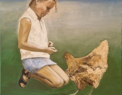 little girl with chicken