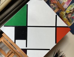 Losange avec orange, vert, violet et gris