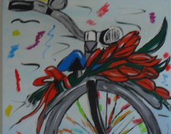 Een fiets met een bos tulpen