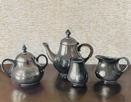 Licht op een oud tinnen thee stel.