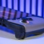 MSI Claw 8 AI+ detail: trekkers links en RGB-verlichte stick met hall-effect links