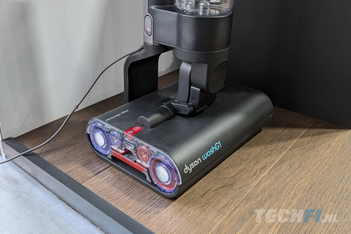 De schoonmaakkop van de Dyson WashG1 bevat twee rollers die in tegenovergestelde richting (van elkaar weg) draaien.